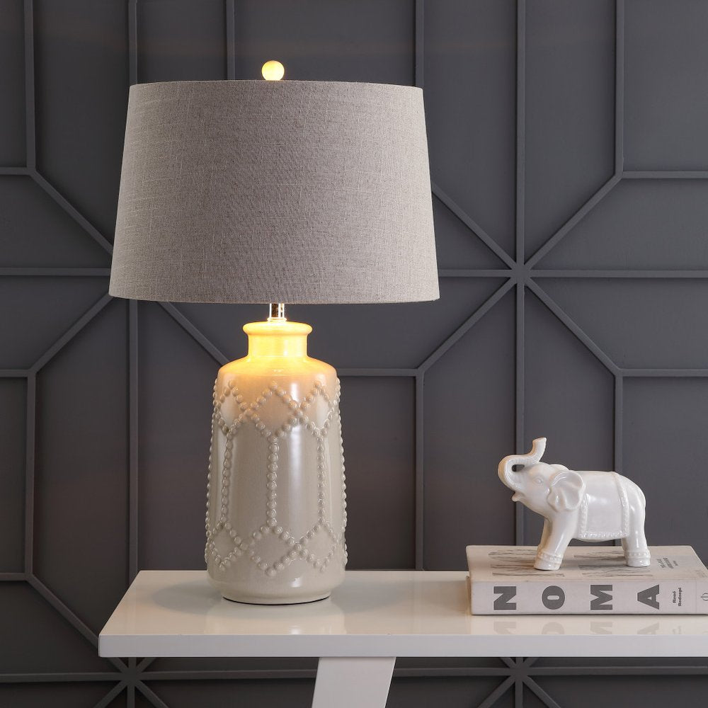 26" Cream Table Lamp With Drum Shade. Table lamp in cream.