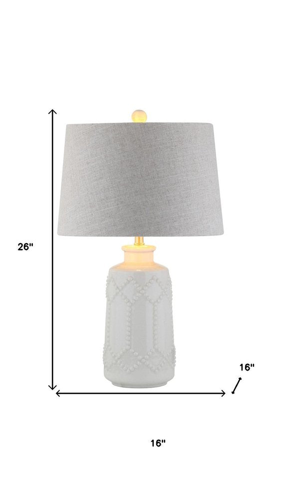 26" Cream Table Lamp With Drum Shade. Table lamp isolated on a plain white background, in a cream finish.