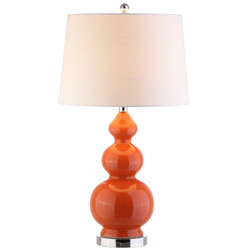 28" Orange And Silver Novelty Table Lamp With Drum Shade. Table lamp isolated on a plain white background.
