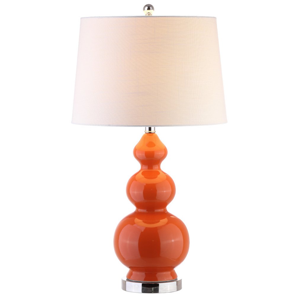 28" Orange And Silver Novelty Table Lamp With Drum Shade. Table lamp isolated on a plain white background, showing its orange color.