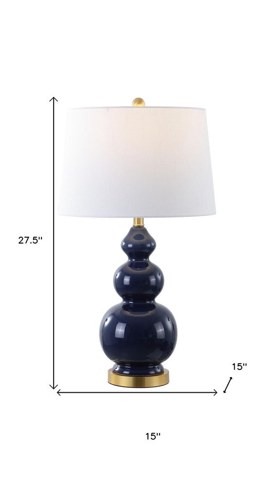 28" Navy Blue And Gold Novelty Table Lamp With Empire Shade. Table lamp isolated on a plain white background, in a navy finish.