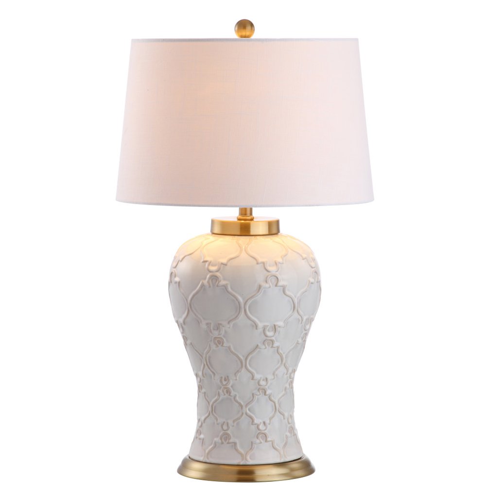 29" Gold Novelty Table Lamp With Drum Shade. Table lamp isolated on a plain white background.