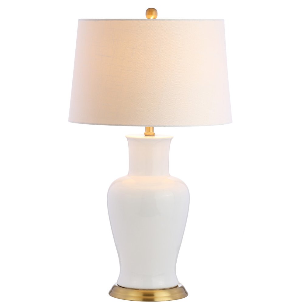 29" Gold Urn Table Lamp With Drum Shade. Table lamp isolated on a plain white background.