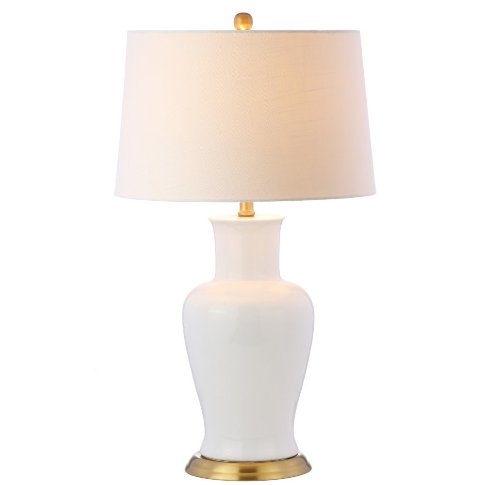 29" Gold Urn Table Lamp With Drum Shade. Table lamp isolated on a plain white background, finished in gold.