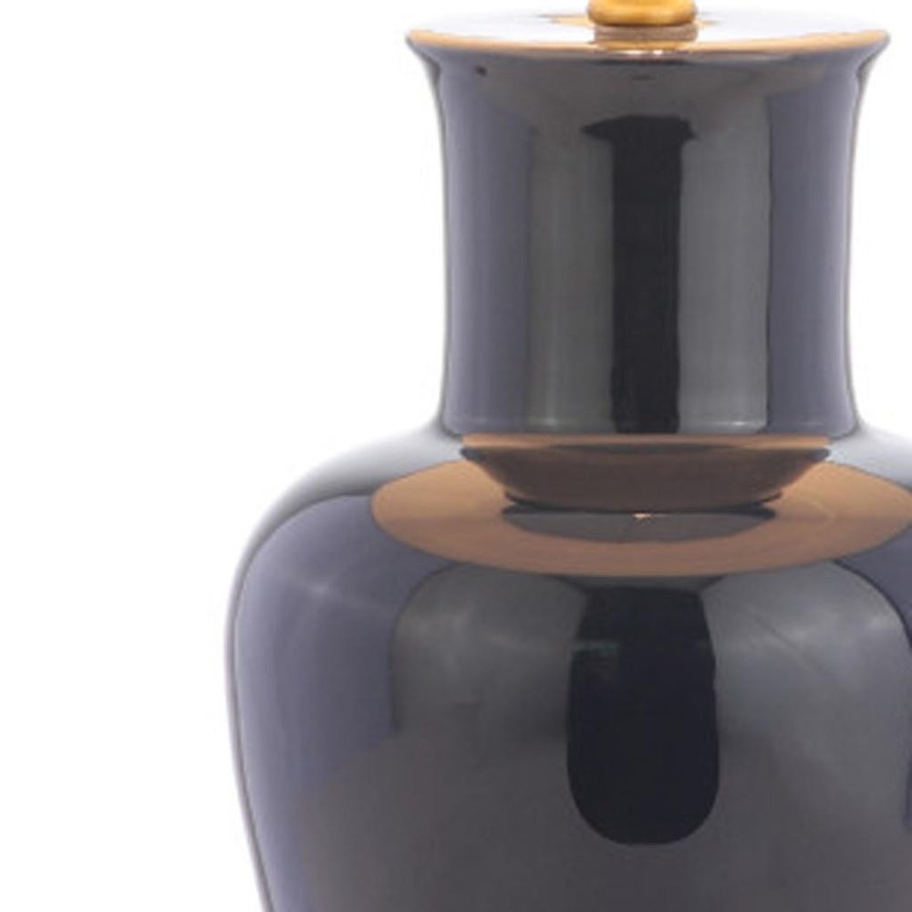 29" Navy Blue And Gold Urn Bedside Lamp With Drum Shade. Lamp isolated on a plain white background, finished in navy.