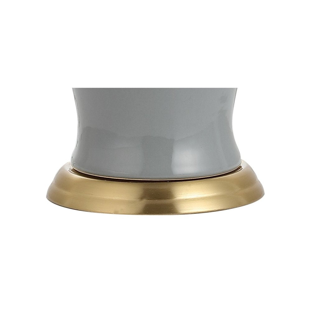 29" Gray And Gold Urn Bedside Lamp With Drum Shade. Lamp isolated on a plain white background, in a gold finish.