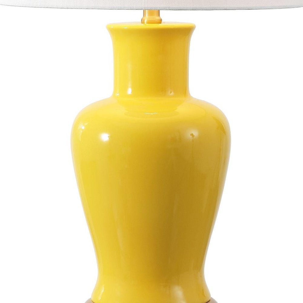 29" Gold Urn Bedside Lamp With Empire Shade. Lamp isolated on a plain white background, finished in gold.