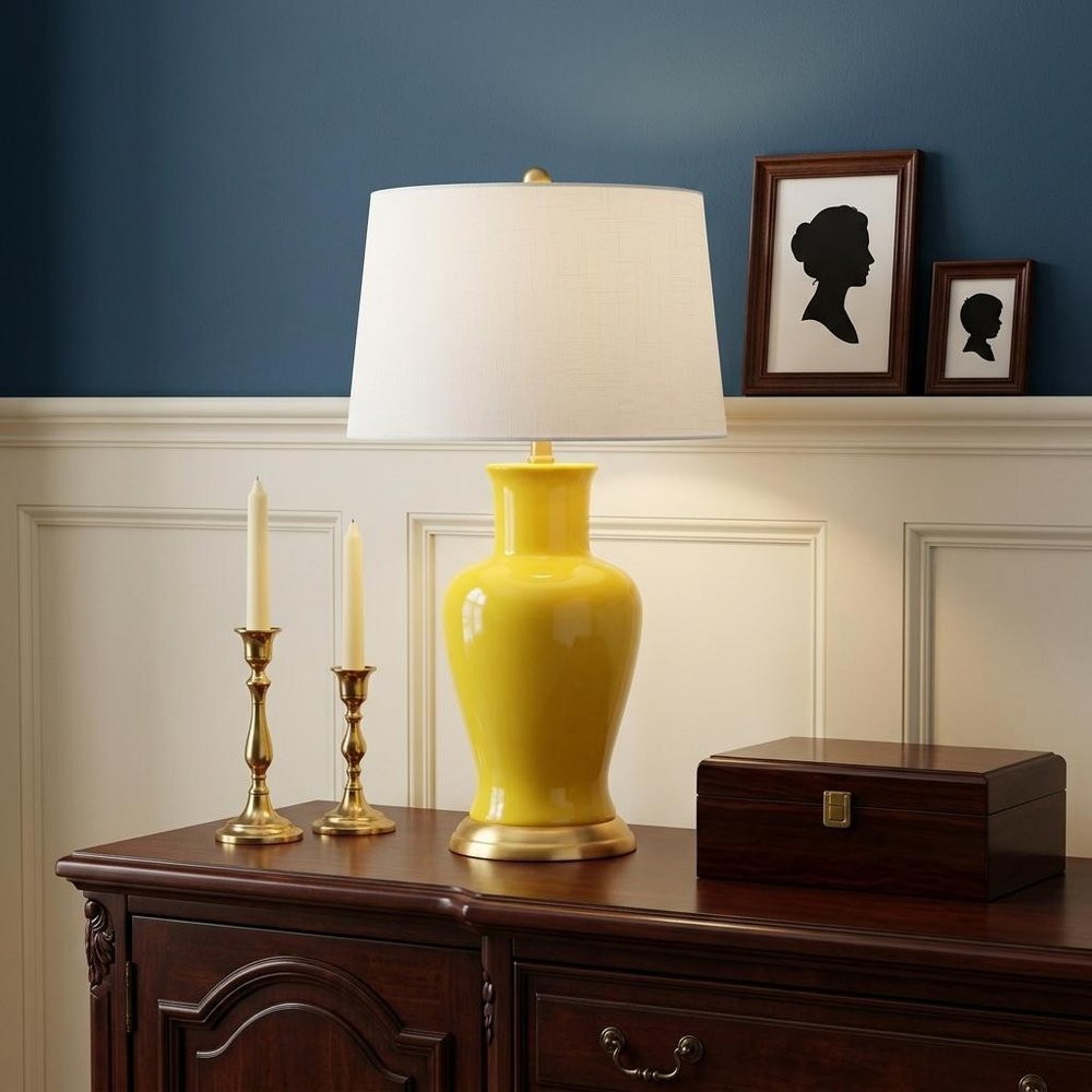 29" Gold Urn Bedside Lamp With Empire Shade shown outdoors on an outdoor setting.