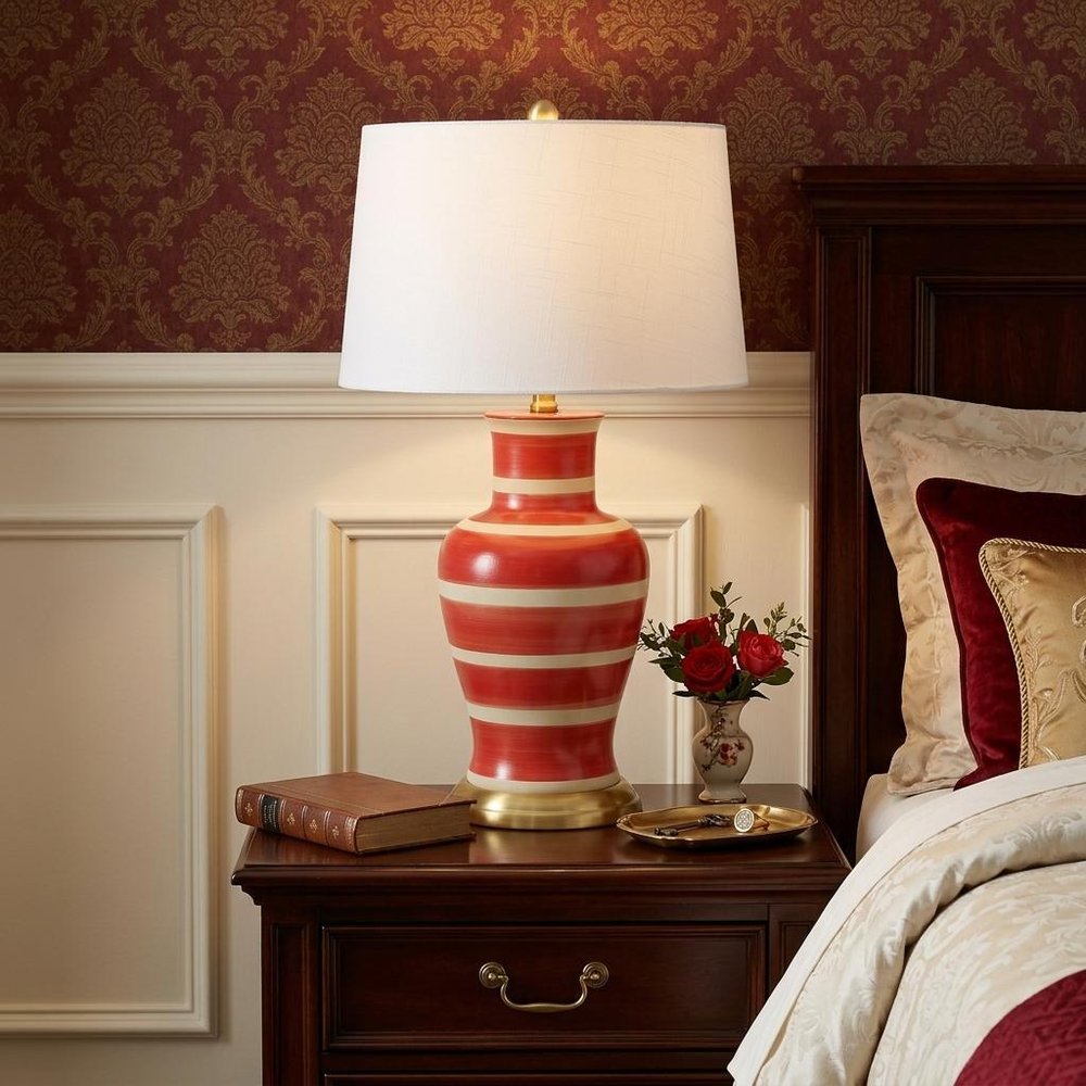29" Gold Urn Table Lamp With Drum Shade. Table lamp in gold.