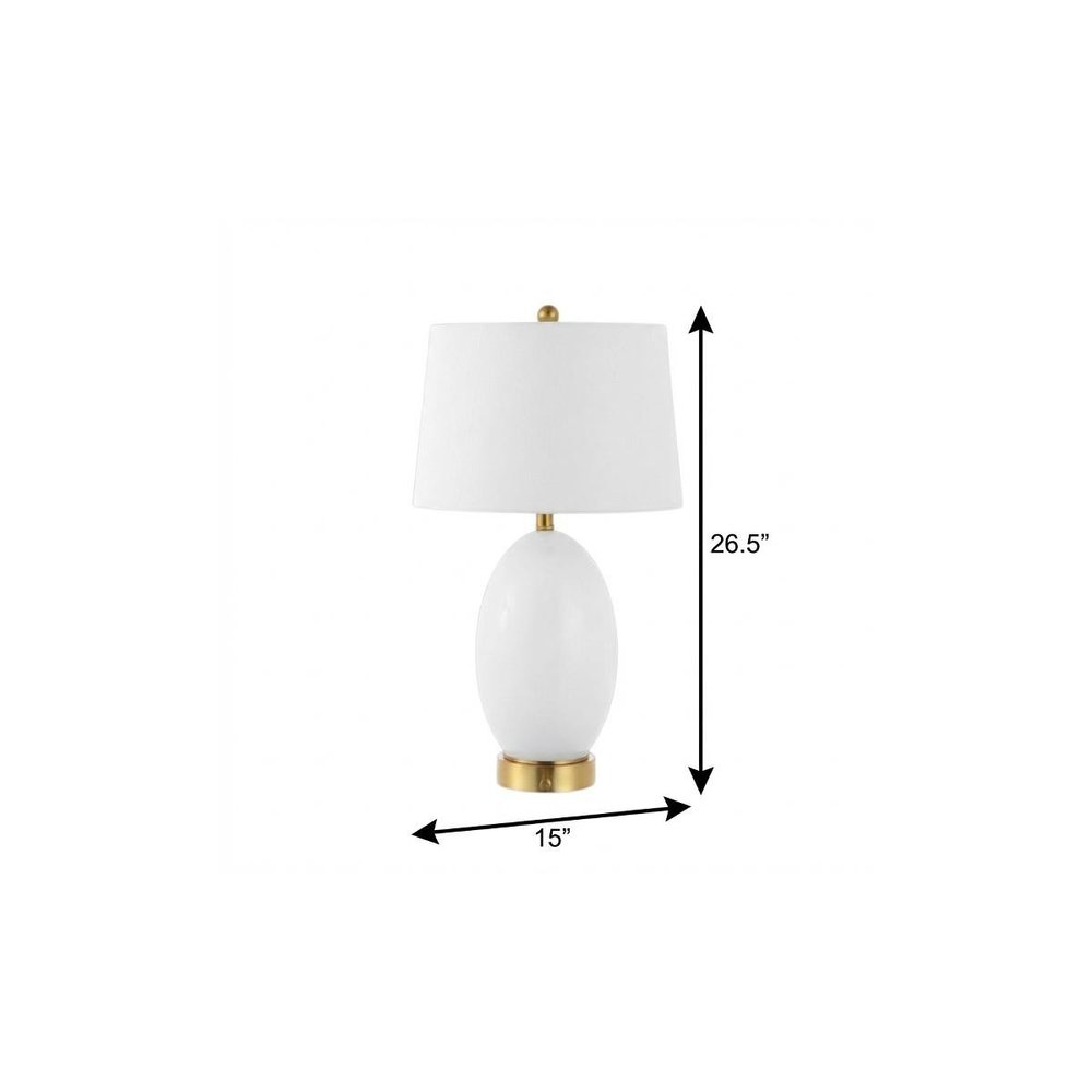 27" Gold Novelty Table Lamp With Empire Shade. Table lamp isolated on a plain white background.