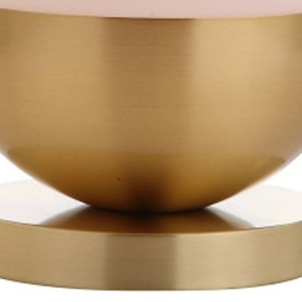 Detail view of 24" Gold Globe Table Lamp With Drum Shade, filling the frame with the gold texture.