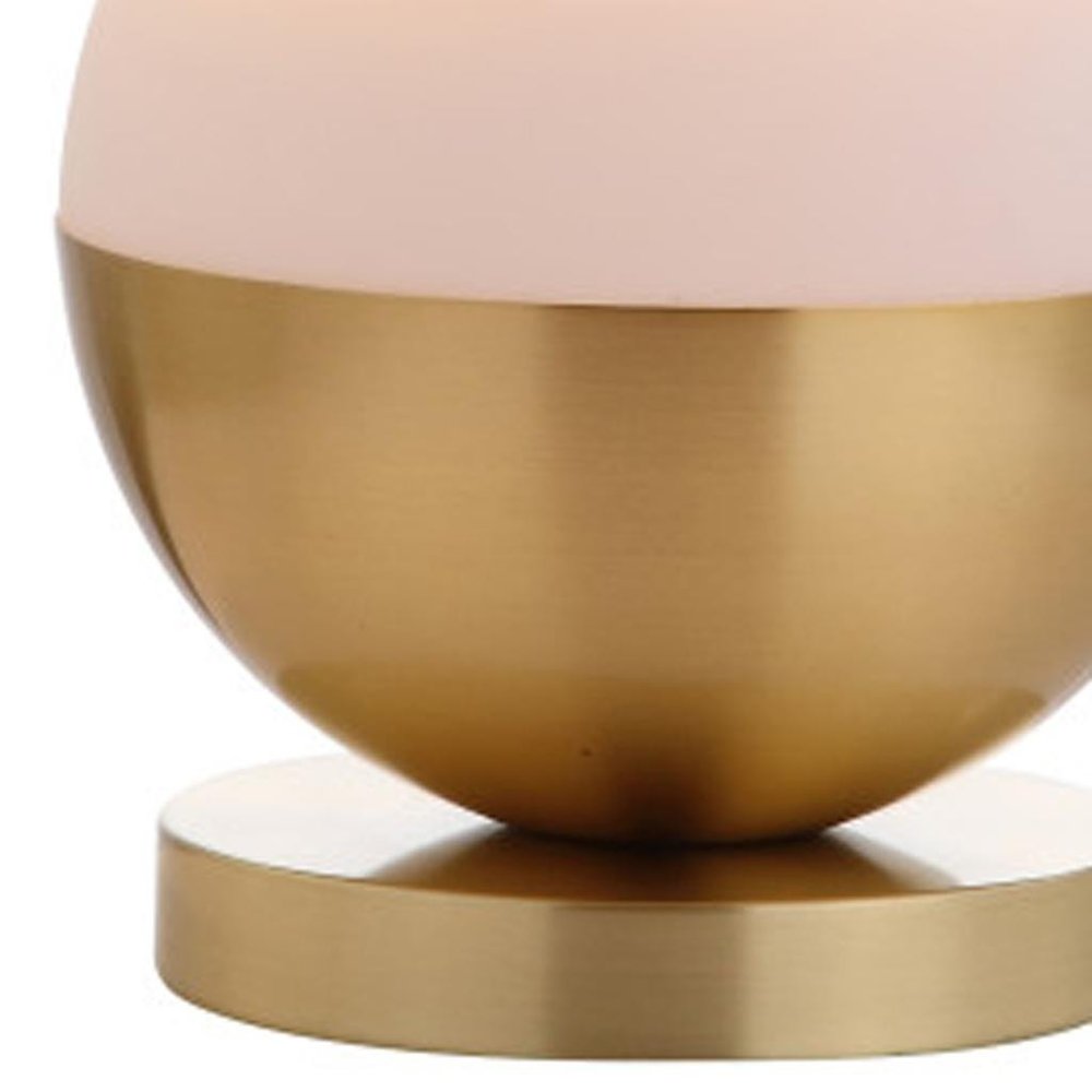 24" Gold Globe Table Lamp With Drum Shade. Table lamp isolated on a plain white background, finished in gold.