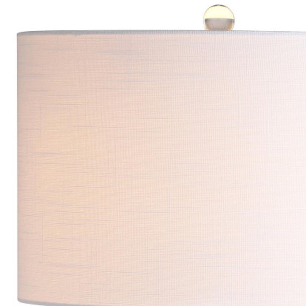 26" Clear Novelty Table Lamp With Drum Shade. Table lamp isolated on a plain white background.