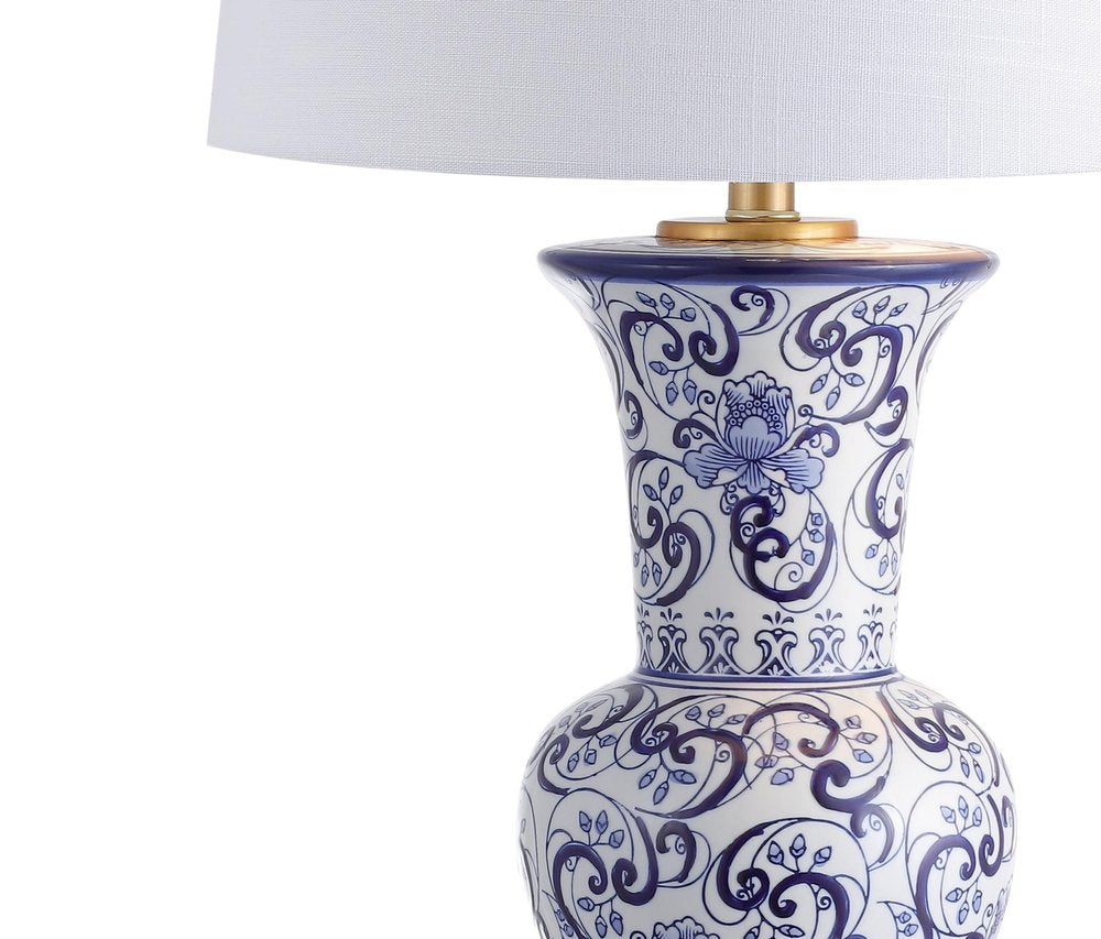 29" Gold Novelty Table Lamp With Drum Shade. Table lamp isolated on a plain white background.