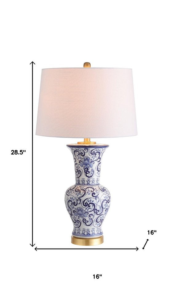 29" Gold Novelty Table Lamp With Drum Shade. Table lamp isolated on a plain white background.