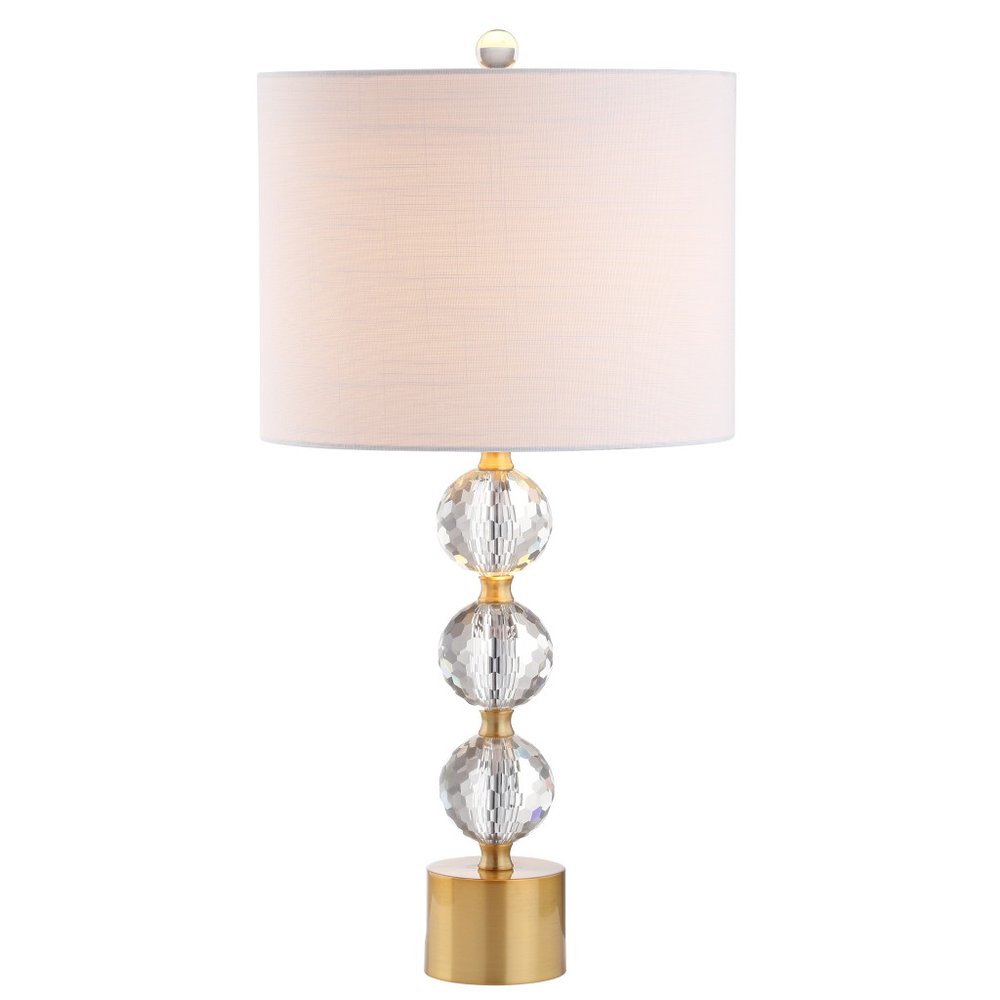25" Gold Novelty Table Lamp With Drum Shade. Table lamp isolated on a plain white background.