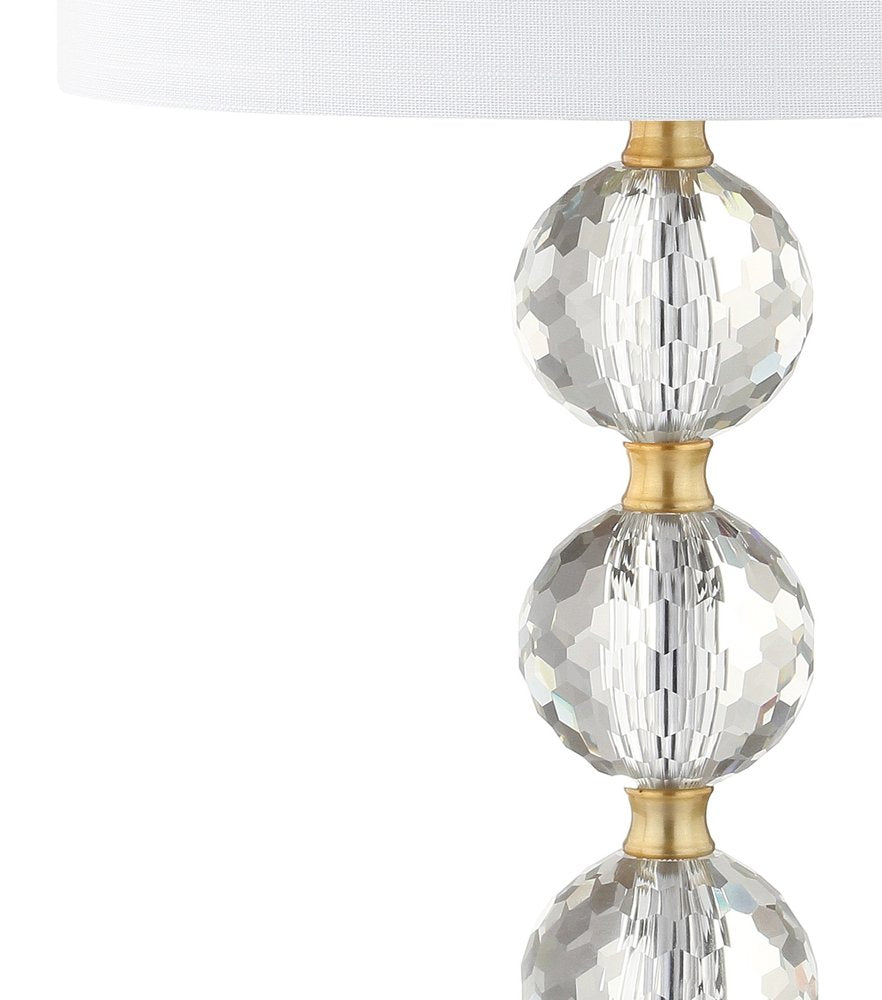 25" Gold Novelty Table Lamp With Drum Shade. Table lamp isolated on a plain white background.