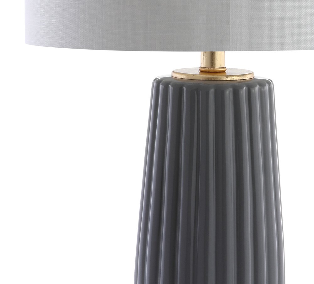 29" Dark Gray And Gold Table Lamp With Drum Shade. Table lamp isolated on a plain white background, finished in charcoal.