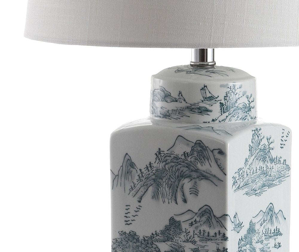 25" Blue And White Table Lamp With Drum Shade. Table lamp isolated on a plain white background, showing its white color.