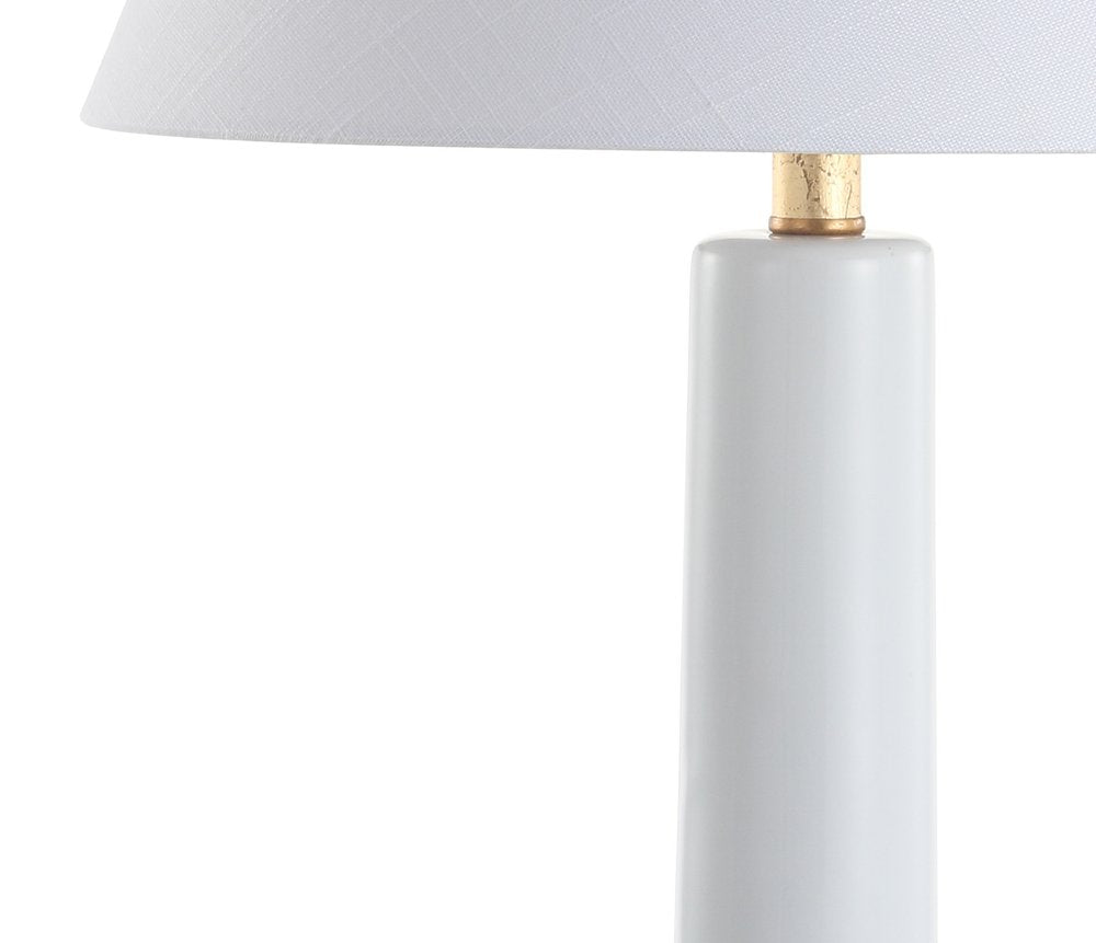29" White And Gold Urn Table Lamp With Empire Shade. Table lamp isolated on a plain white background, showing its gold color.