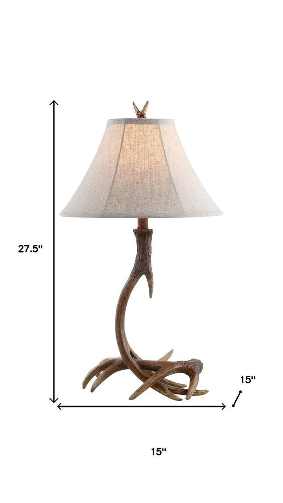 28" Brown Novelty Table Lamp With Globe Shade. Table lamp isolated on a plain white background.