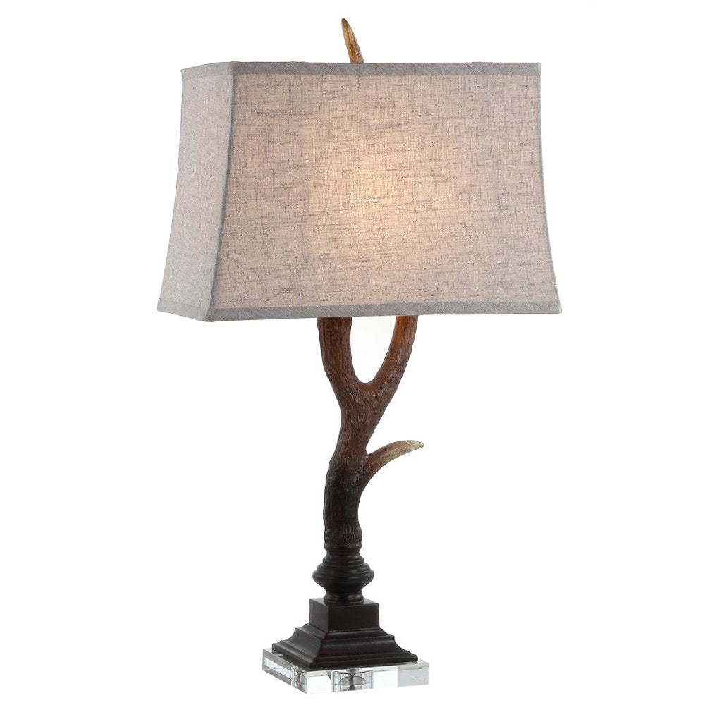 30" Brown And Clear Novelty Table Lamp With Shade. Table lamp isolated on a plain white background, in a brown finish.