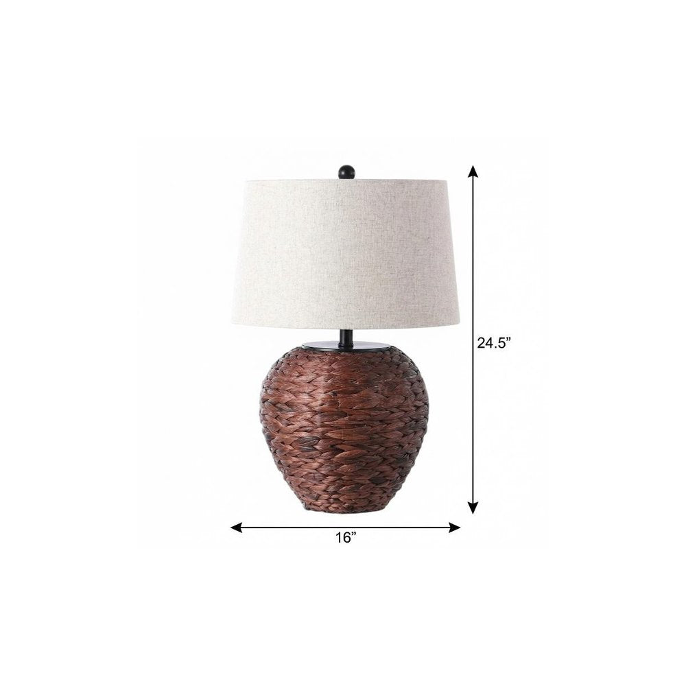 25" Clear Urn Table Lamp With Globe Shade. Table lamp isolated on a plain white background, in a clear finish.