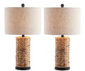 Set of Two 25" Natural And Black Bedside Lamps With Drum Shades on a white background