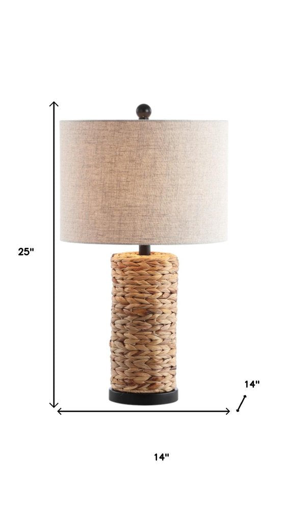 Set of Two 25" Natural And Black Bedside Lamps With Drum Shades on a white background