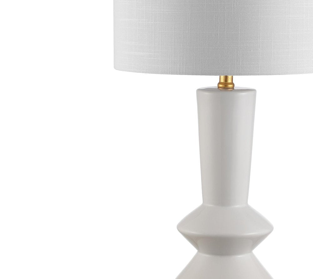 27" White And Gold Geometric Table Lamp With Drum Shade. Table lamp isolated on a plain white background, showing its white color.