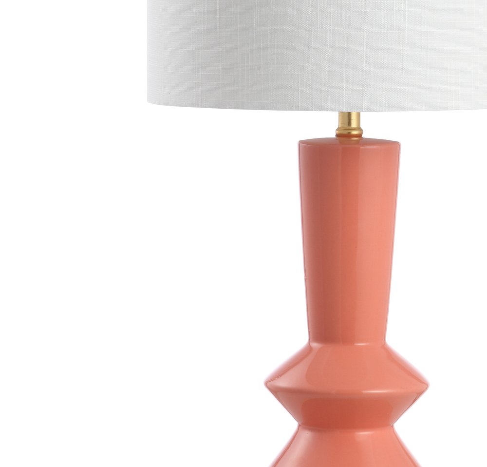 27" Gold Geometric Table Lamp With Drum Shade. Table lamp isolated on a plain white background.