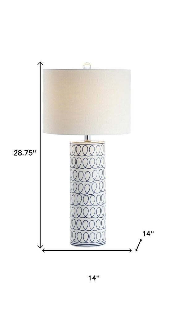 29" White Table Lamp With Drum Shade. Table lamp isolated on a plain white background, in a white finish.