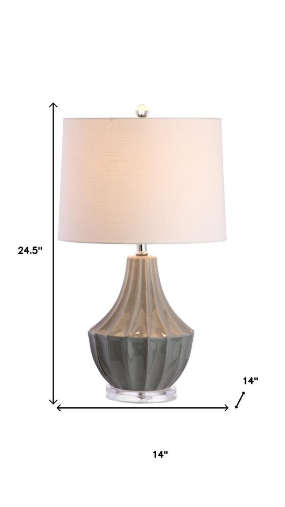 25" Gray And Clear Novelty Table Lamp With Drum Shade. Table lamp isolated on a plain white background.