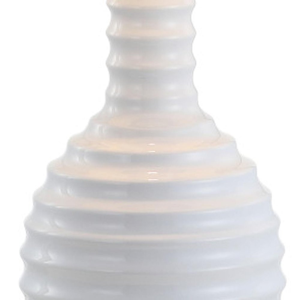 30" Clear Novelty Table Lamp With Globe Shade. Table lamp isolated on a plain white background, showing its clear color.
