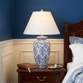 26" White Novelty Table Lamp With Globe Shade shown outdoors on an outdoor setting.