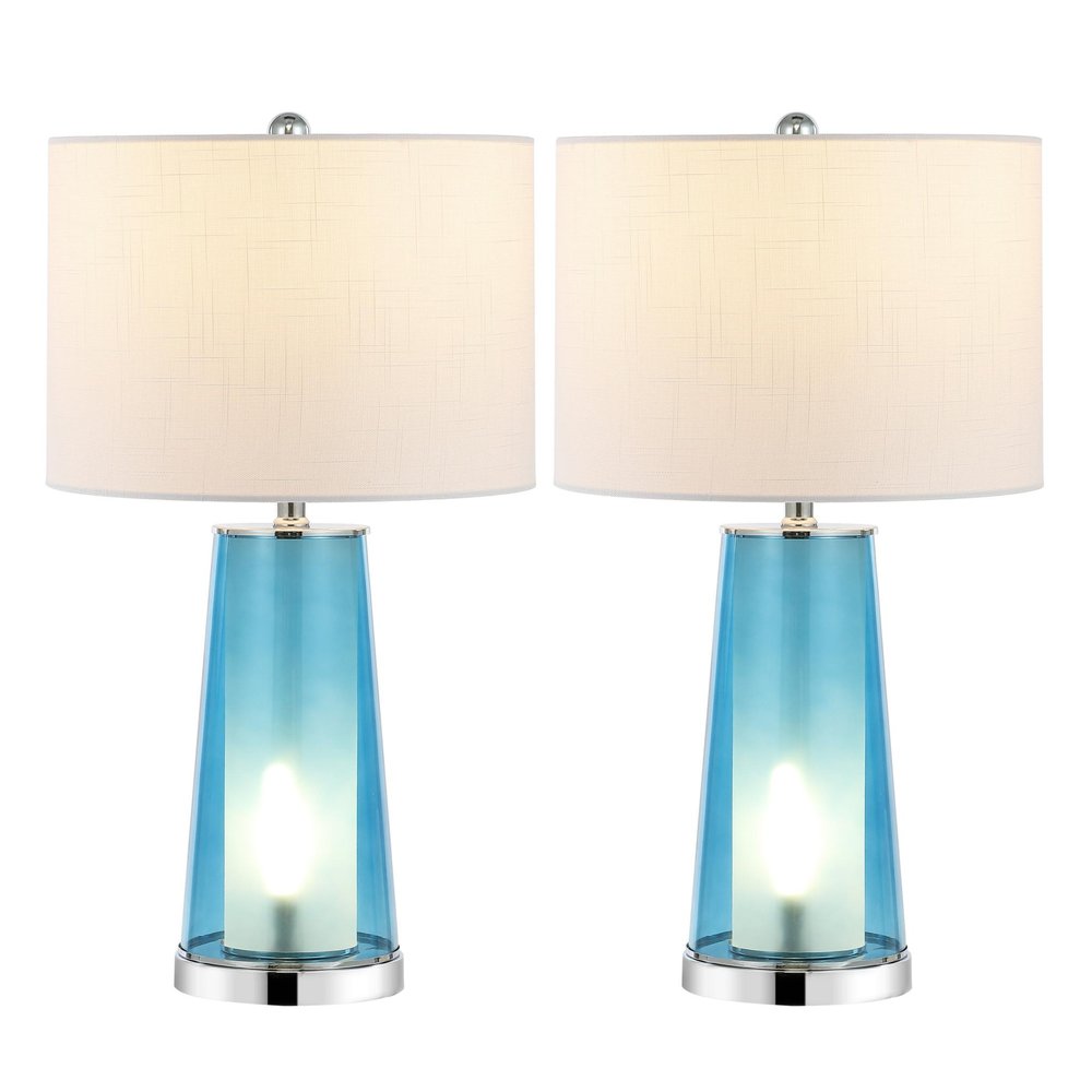 Two silver and blue glass table lamps with white drum shades on a white background.