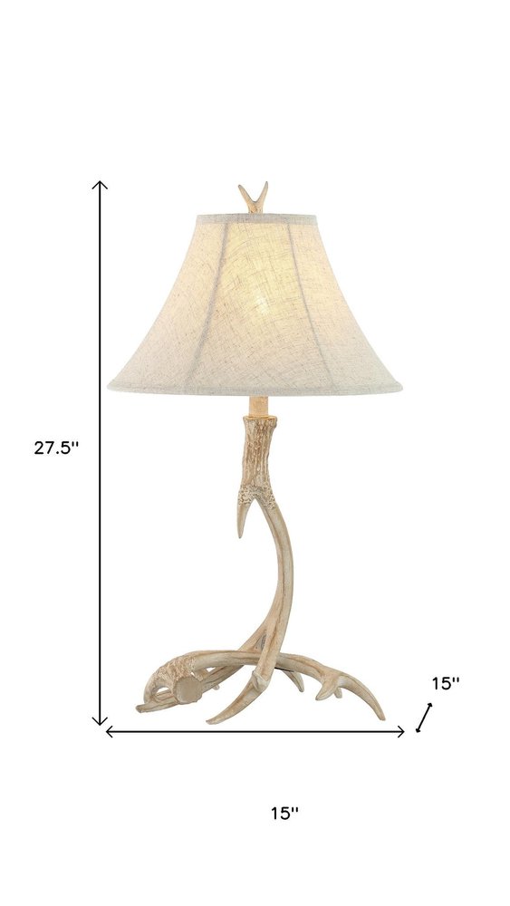28" Beige Antlers Table Lamp With Bell Shade. Table lamp isolated on a plain white background, showing its beige color.