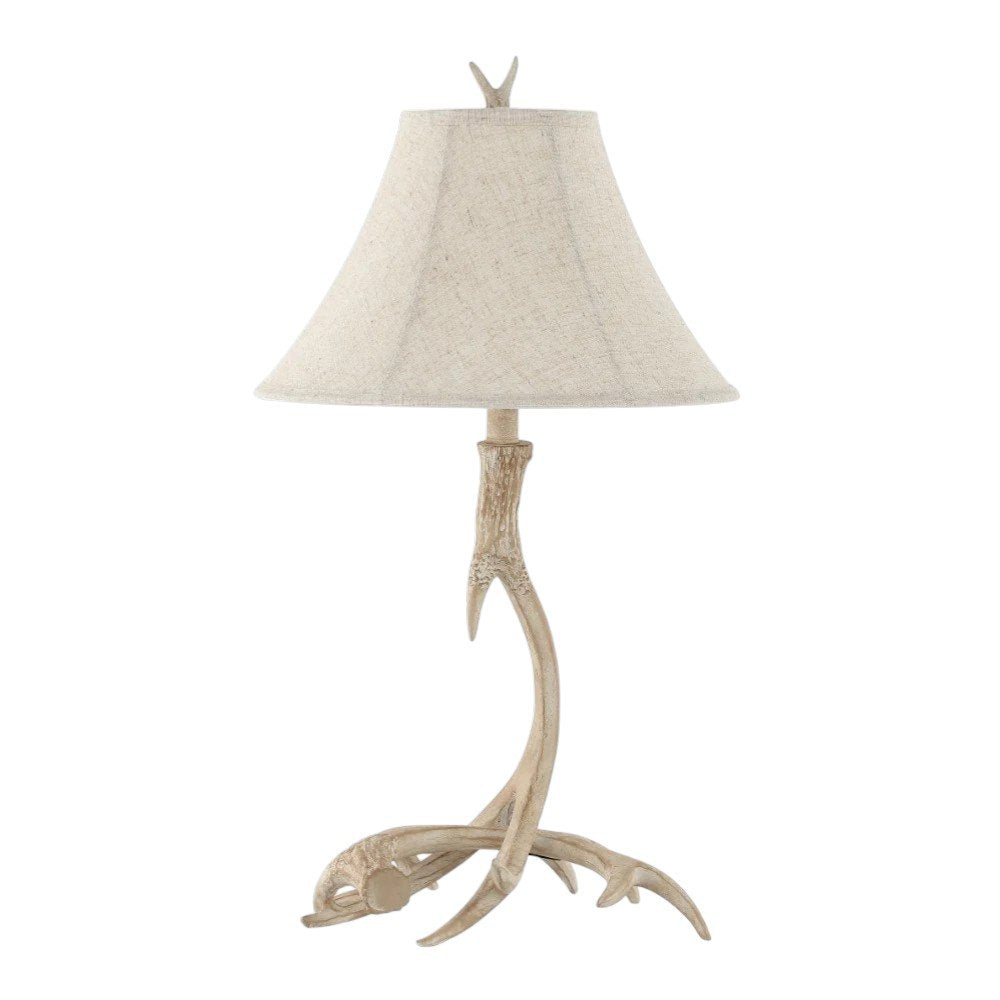 28" Beige Antlers Table Lamp With Bell Shade. Table lamp isolated on a plain white background, in a beige finish.