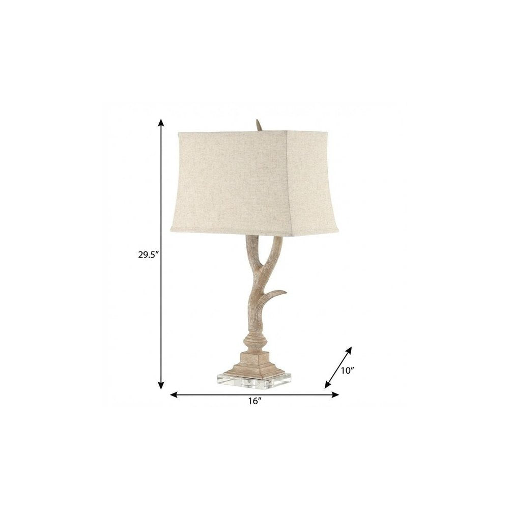 30" Clear Antlers Table Lamp With Shade. Table lamp isolated on a plain white background.