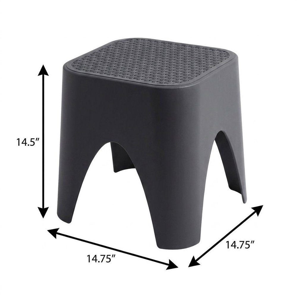 15" Plastic Outdoor Footstool Ottoman. Outdoor ottoman isolated on a plain white background, showing a plastic surface.