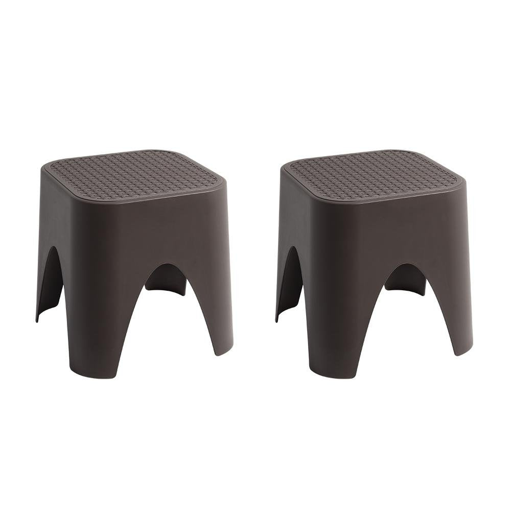 15" Plastic Outdoor Footstool Ottoman. Outdoor ottoman isolated on a plain white background, showing a plastic surface.