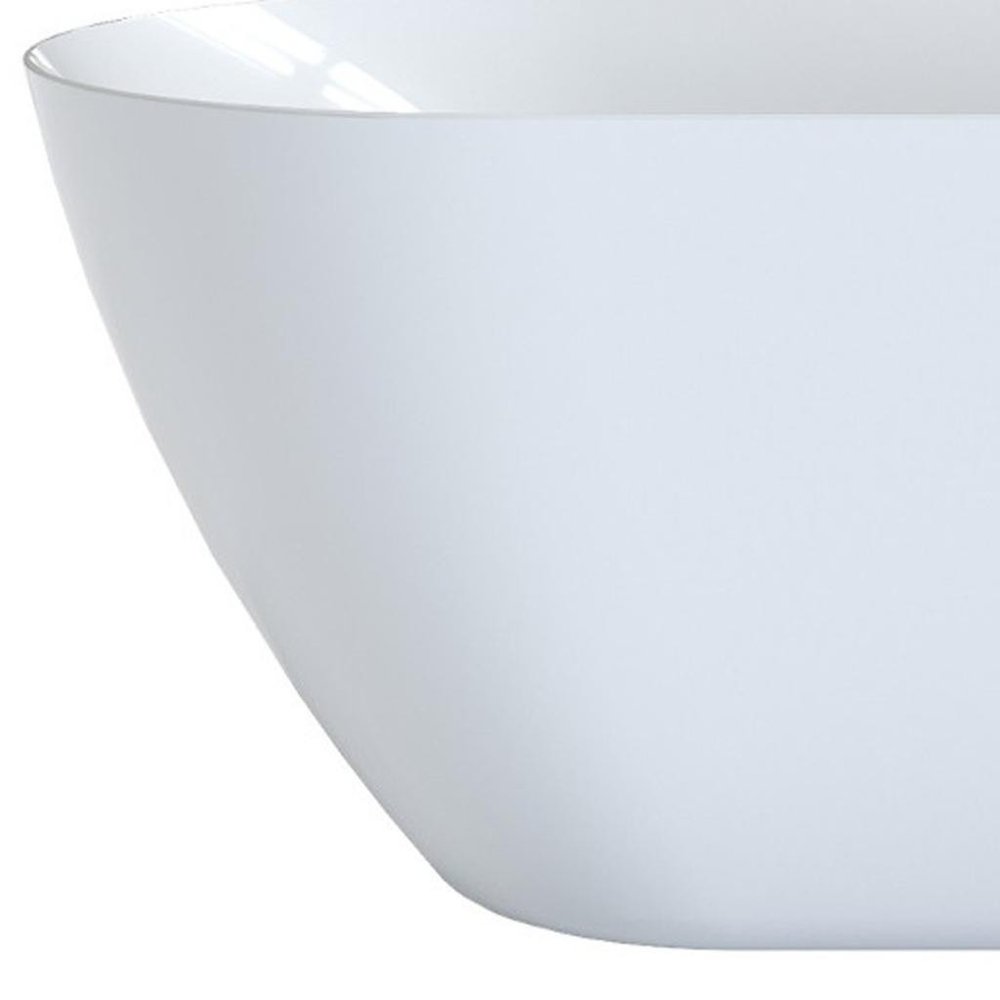 63" White Acrylic Oval Bath Tub. Bathtub isolated on a plain white background, showing its white color.
