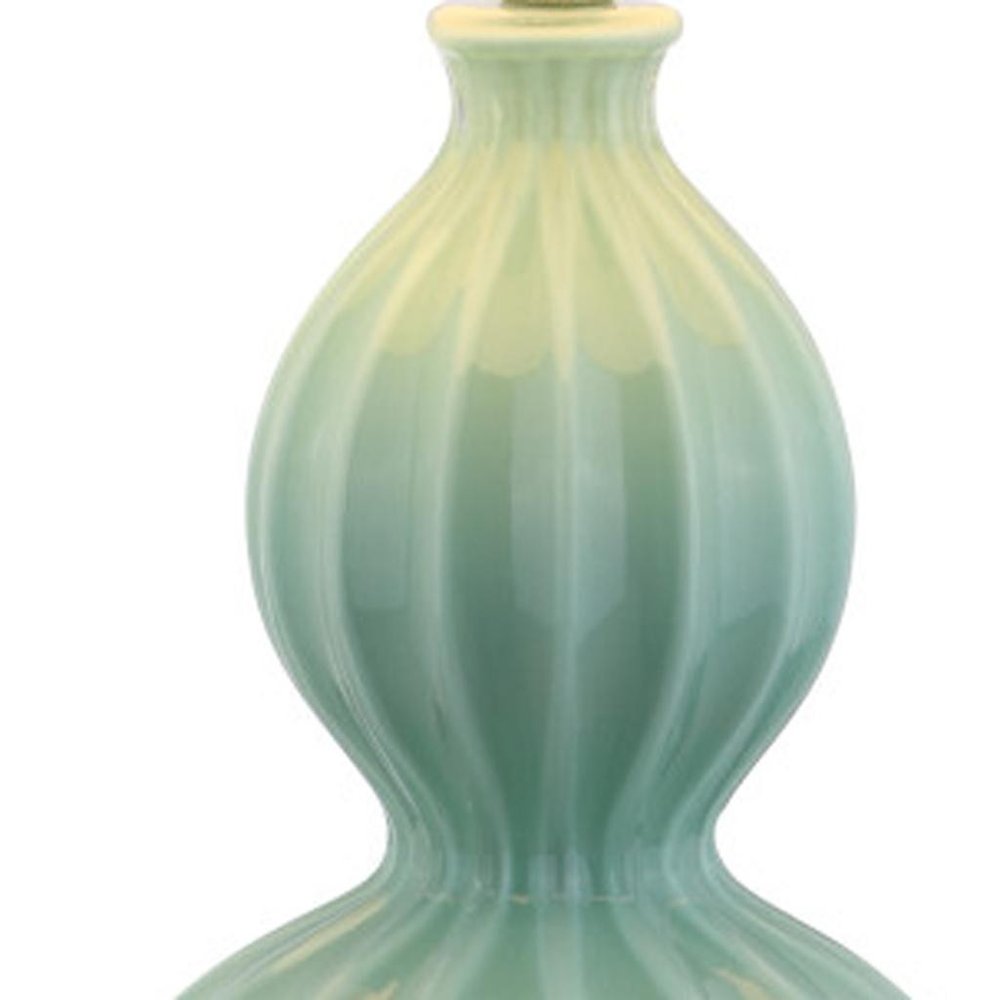 28" Clear Novelty Table Lamp With Drum Shade. Table lamp isolated on a plain white background.