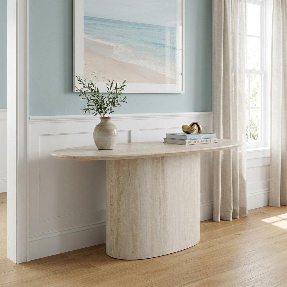 71" Beige Genuine Marble Oval Pedestal Console Table in a home interior