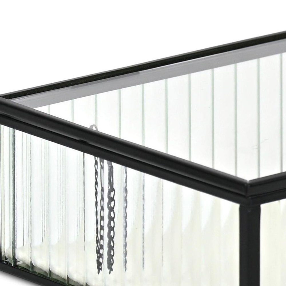 10" Black Glass Two Section Jewelry Box With Metal Accents. Jewelry boxe isolated on a plain white background, finished in black glass.