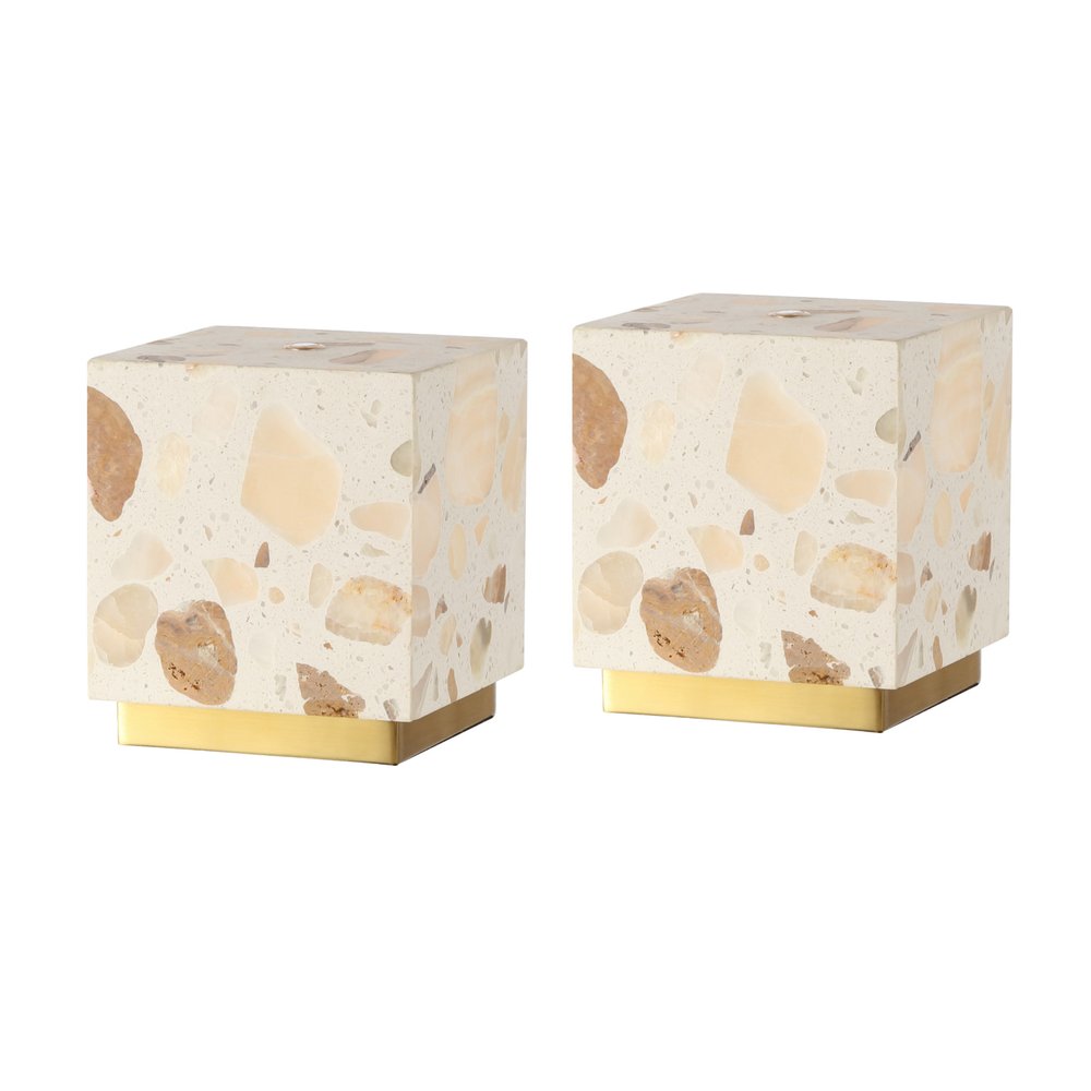 Two square terrazzo table lamps with gold bases on a white background.