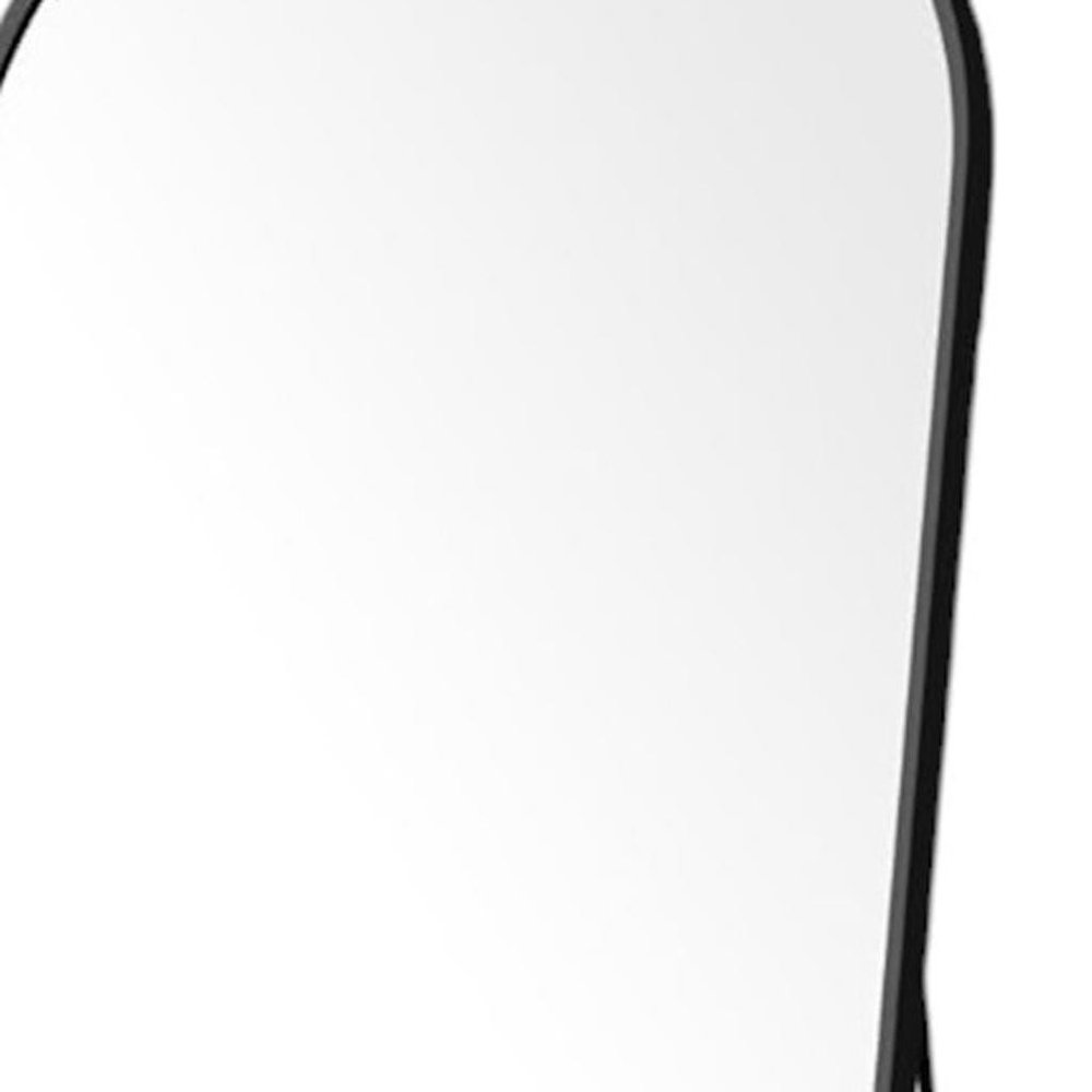 Black metal framed full length mirror with an arch top, shown leaning against a white background.