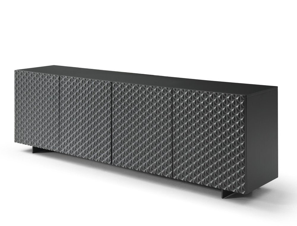 Dark gray wood sideboard with carved geometric doors and black metal legs on a white background.