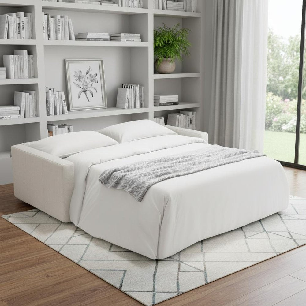 81" White Leather Sleeper Sofa in a home interior