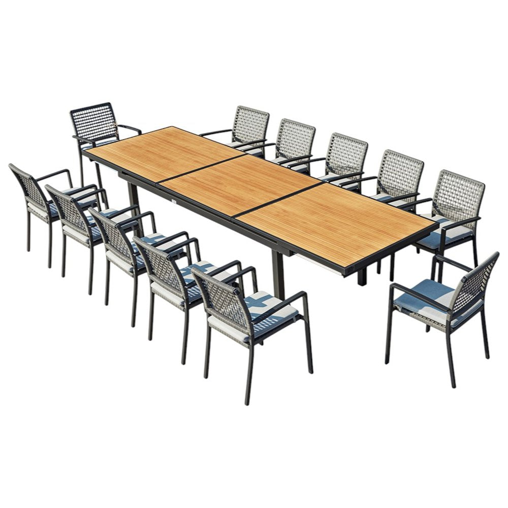 13-piece dining set with a natural wood tabletop and black metal frame, featuring twelve woven chairs with blue and white cushions, set against a white background.